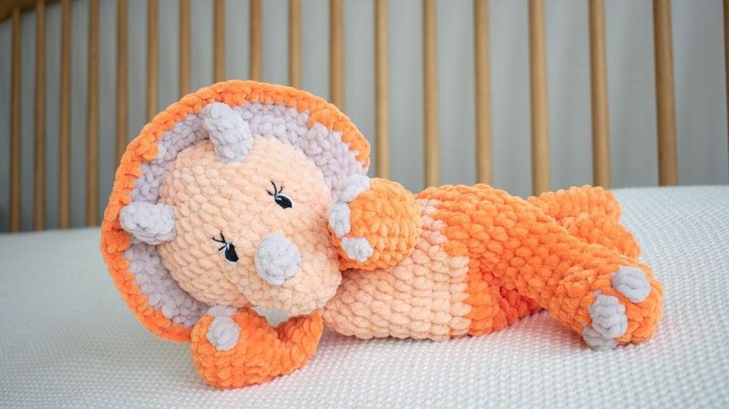 Triceratops Snuggler free crochet pattern by Ana Figueiredo